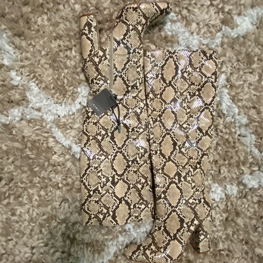 Snake knee high boots!